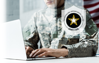 Photo: Army soldier using laptop - Army COOL program.