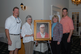 Rakoczy family with Coach Bill Gordon portrait